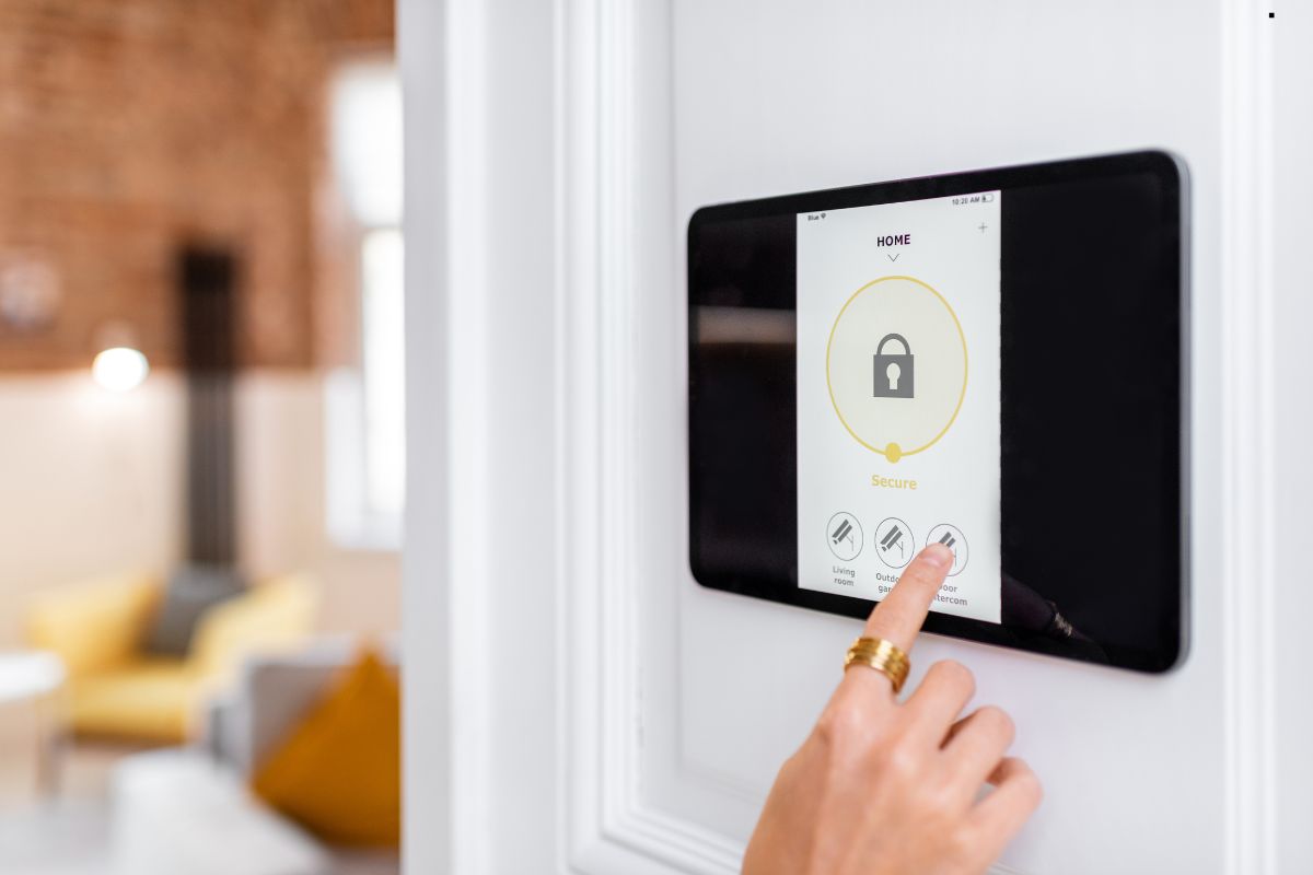 A person interacting with a smart lock on a door, emphasizing modern home security technology.