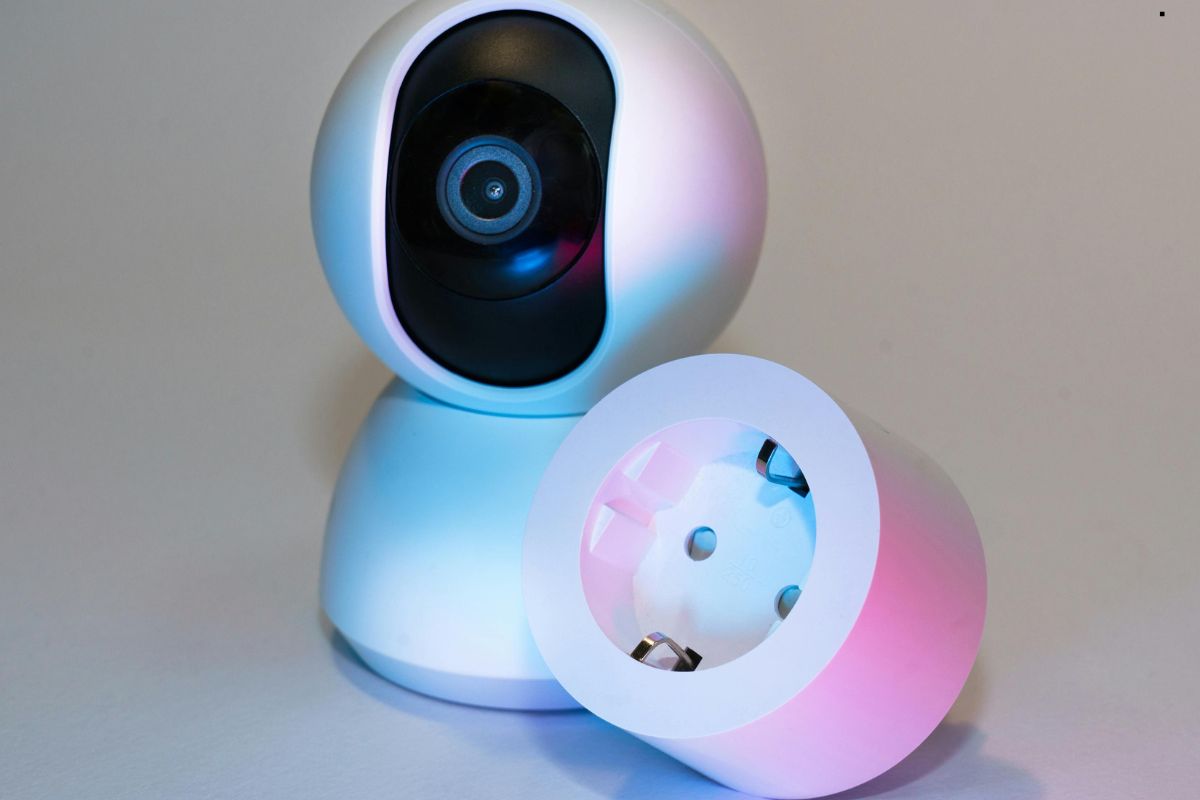 A smart camera designed for home security, featuring an integrated light for improved surveillance.